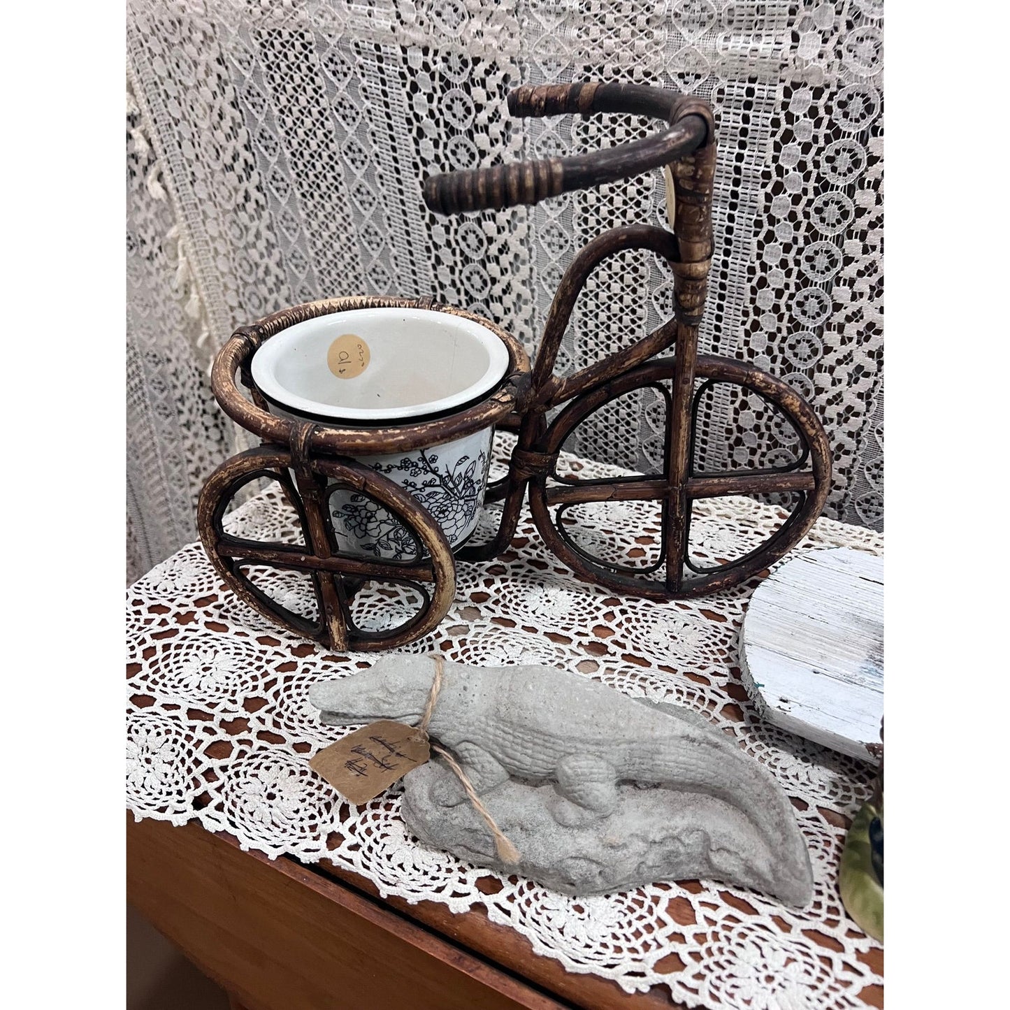Bicycle planter with black & white floral planter