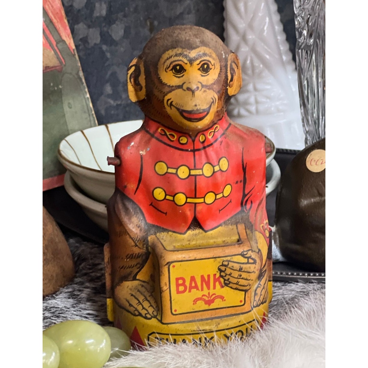 Vintage monkey bank, tin