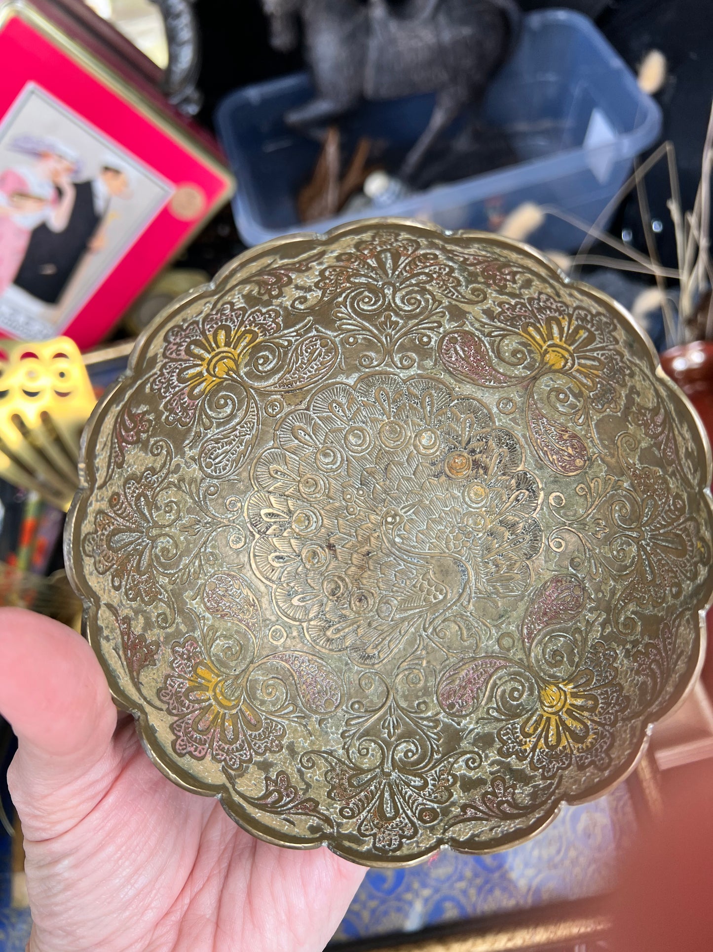 Pedestal brass dish with Peacock in center & beautiful color around the outside