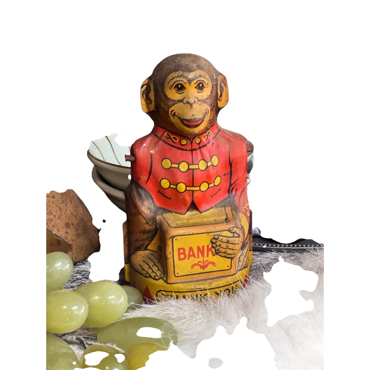 Vintage monkey bank, tin