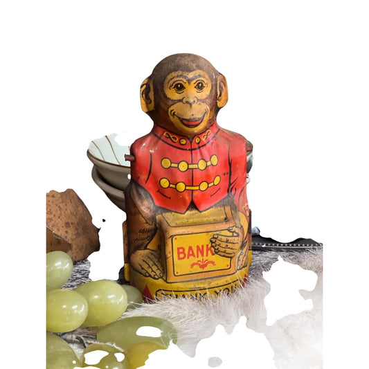 Vintage monkey bank, tin